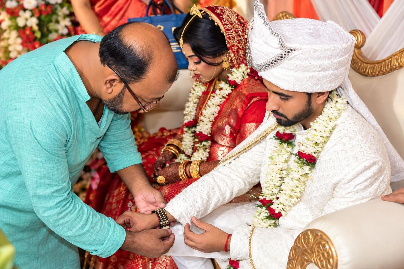Wedding rituals with the family blessing the couple